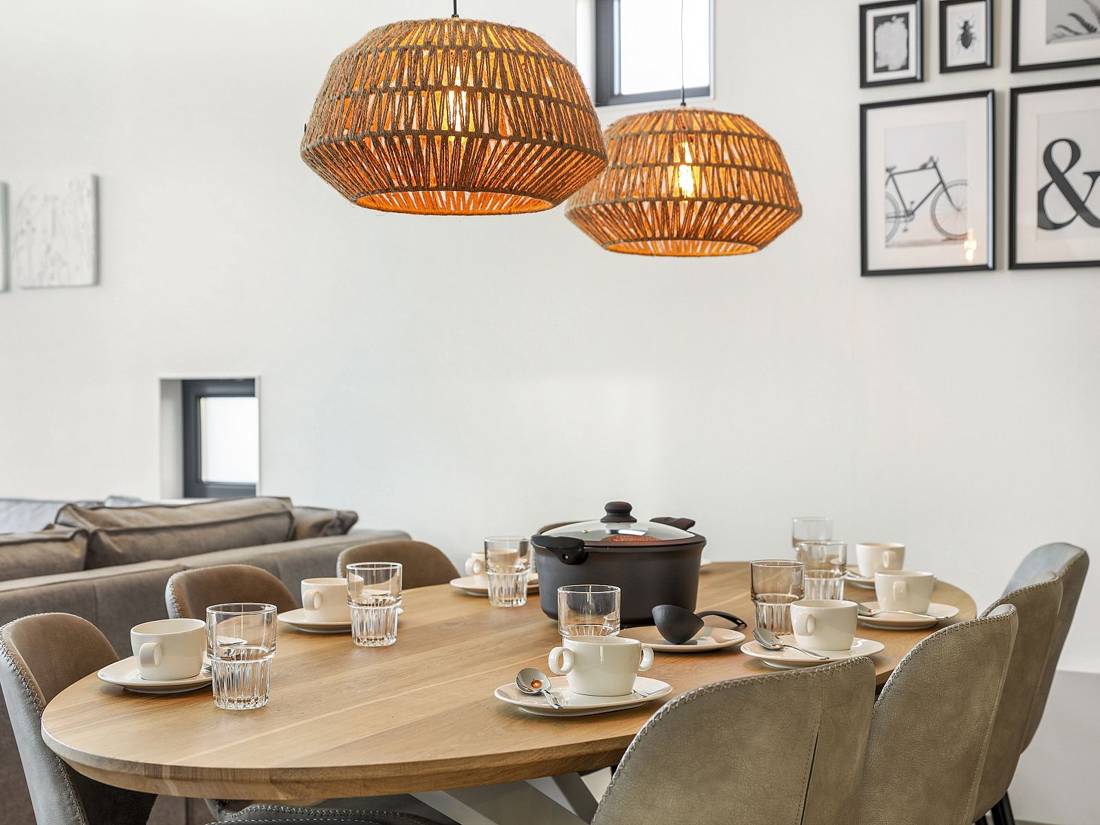 Spacious terrace of De Vlinderhoeve bungalow in Kring van Dorth with garden furniture and sunshade.
