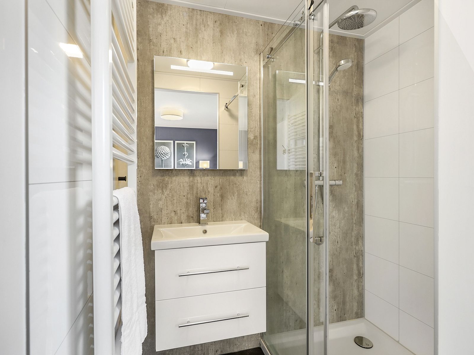 Stylish bathroom in De Vlinderhoeve vacation home in Achterhoek with modern amenities.