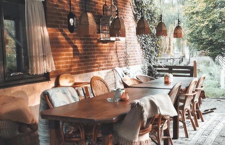 Cozy bedroom in Cottage in Voorst, Oude IJsselstreek, with decorative signs on the wall, located in Achterhoek, Gelderland.