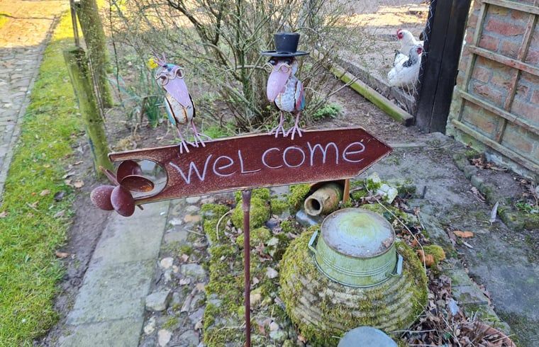 Welcome sign at Holiday Home in Winterswijk Corle, an inviting vacation home in the Achterhoek.