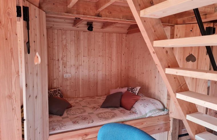 Wooden interior with stairs in Holiday home in Winterswijk Corle, a cozy residence in the Achterhoek.