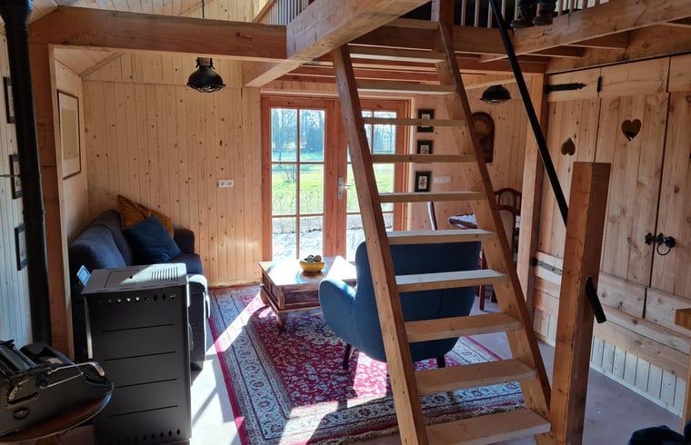 Sitting area with view in Holiday home in Winterswijk Corle, a charming vacation home in the Achterhoek.