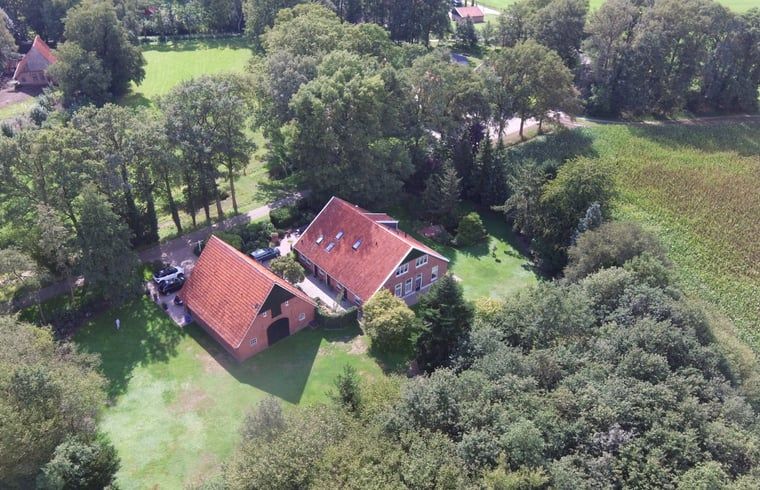 Aerial view of Holiday Home in Winterswijk Corle, surrounded by lush nature in Achterhoek, Gelderland.