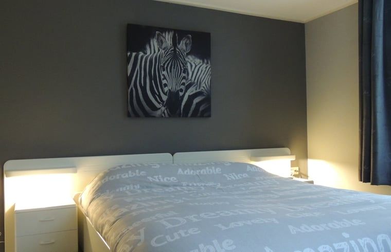 Attractive bedroom in Holiday Home in Winterswijk Corle, Achterhoek, with comfortable double bed and stylish decoration.