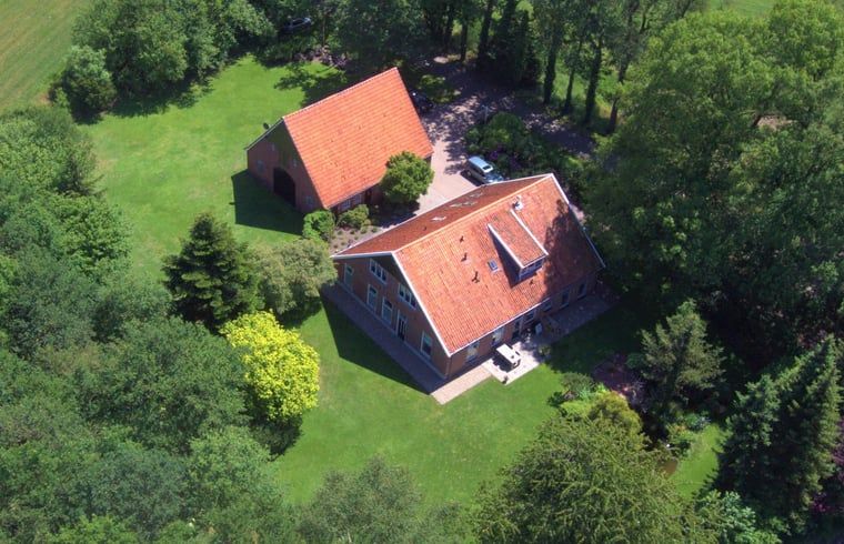 Aerial photo of Holiday home in Winterswijk Corle, located in the green nature of Achterhoek, Gelderland.