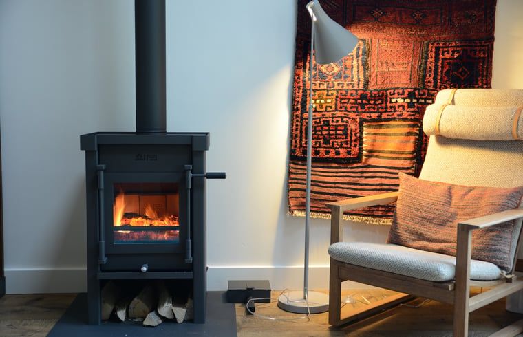 Knusse open haard in Vakantiehuis in Varssel - Hengelo Gld, ideaal voor ontspanning in de Achterhoek.