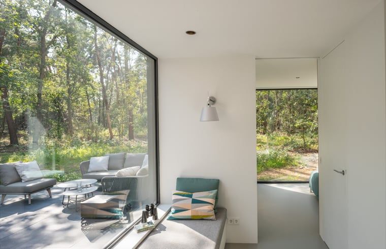 Gemuetliche Sitzecke im Ferienhaus in Tonden, mit Zugang zum Garten.