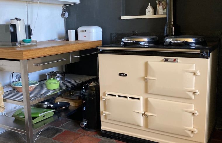 Gemuetlicher Innenraum des Ferienhauses in Voorstonden Gem. Brummen, Ferienhaus im Gelderse Vallei, Gelderland, mit bequemen Sitzgelegenheiten.