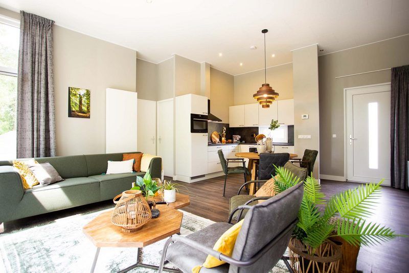 Spacious living room in Beekhoeve 4 persons Wellness, Beekbergen, Veluwe, vacation home with open kitchen.