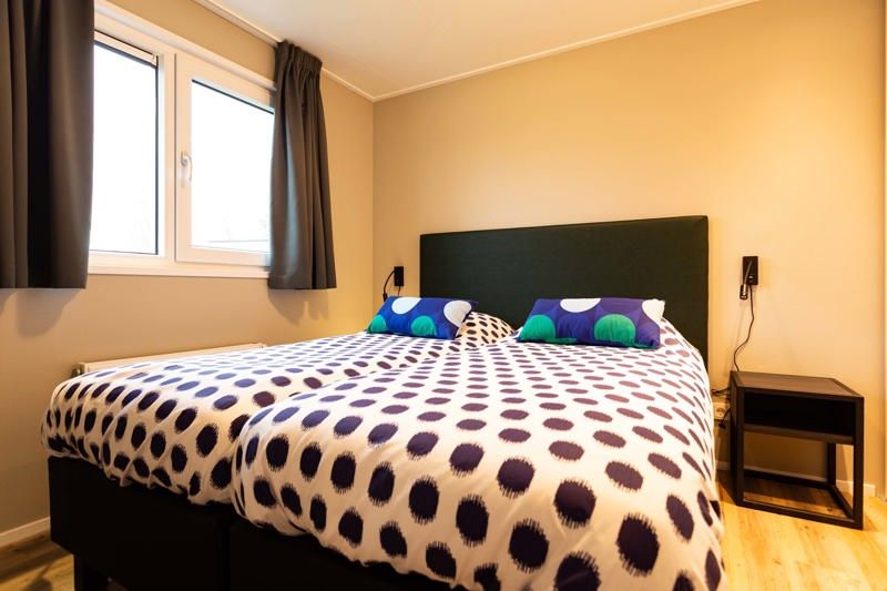 Gemuetliches Schlafzimmer im Ferienhaus Leijhoeve fuer 6 Personen in Beekbergen, Veluwe, Gelderland, mit bequemen Betten.