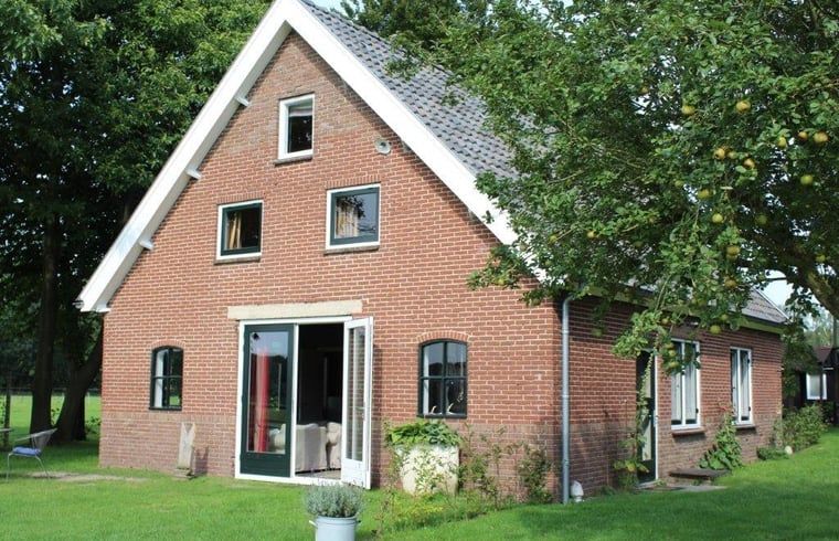 Huisje in Kootwijk, vakantiehuis met tuin en traditionele architectuur in Veluwe, Gelderland.