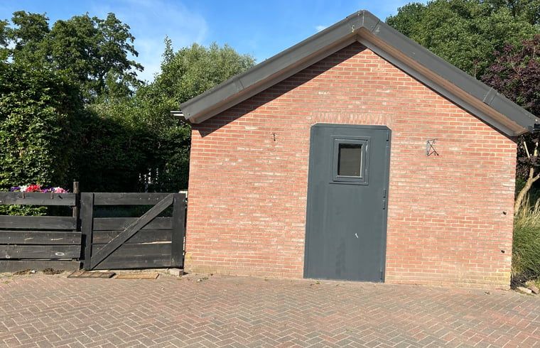 Rustic outbuilding of Cottage in Ede, located in the green Veluwe, Gelderland.