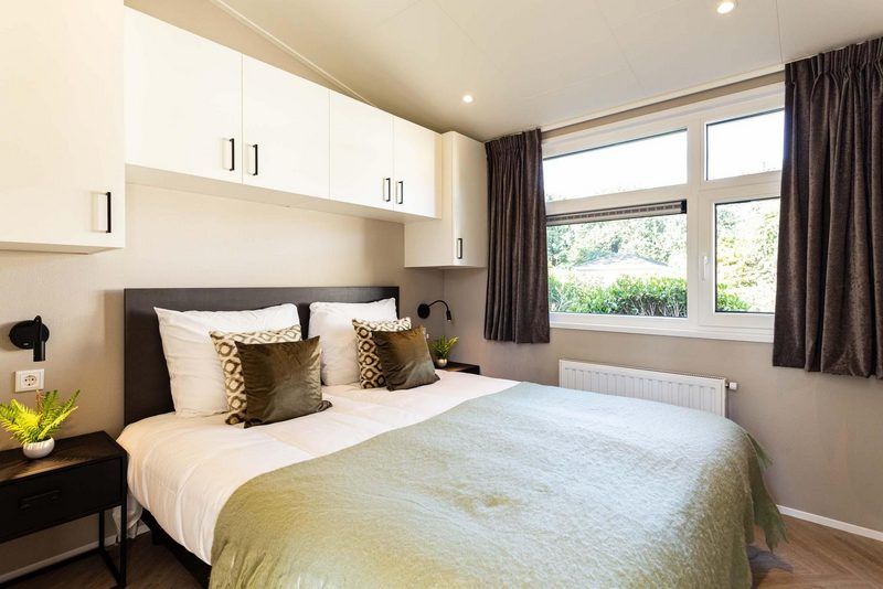 Luxe slaapkamer in Silva 4 personen vakantiehuis, Ede, Veluwe met uitzicht op natuur.