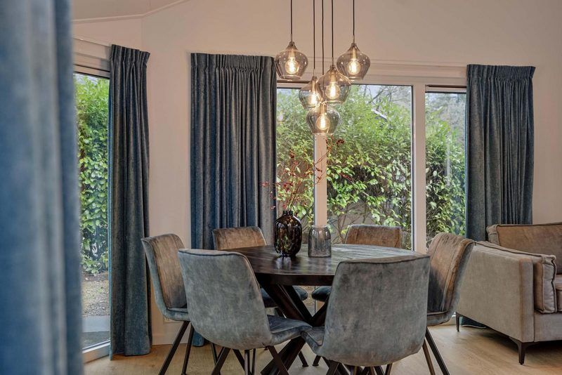 Dining area with view in Ferox 5 persons Wellness vacation home in Ede, Veluwe.