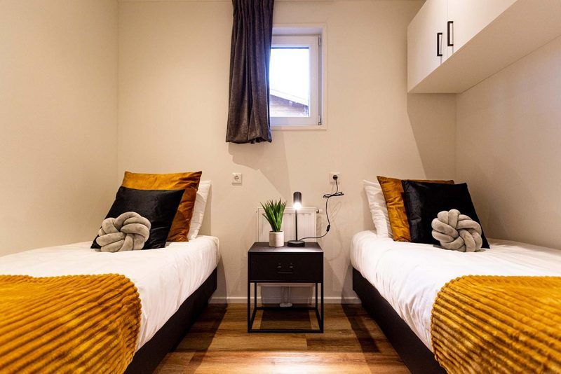 Zweites Schlafzimmer mit zwei Betten in Module Wood 4 Personen Wellness, Ferienwohnung in Ede, Veluwe.