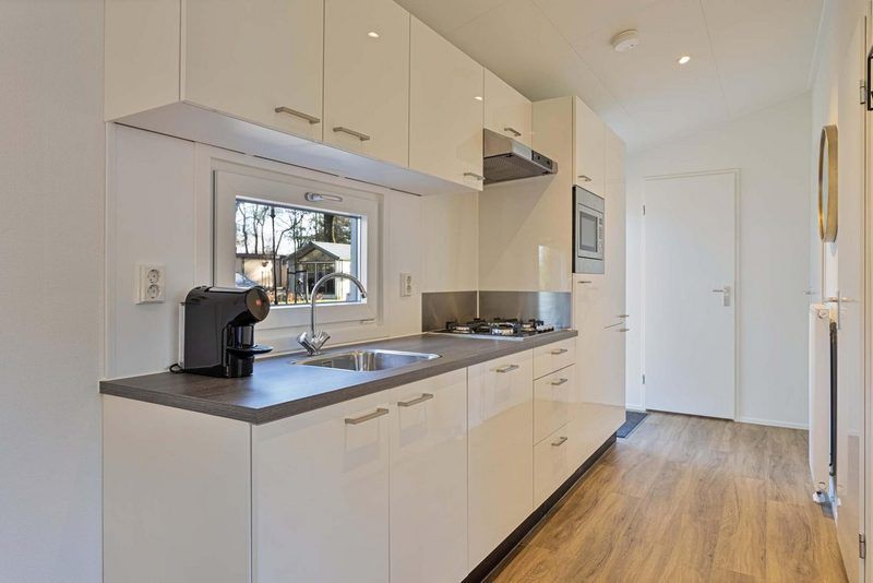 Keuken met moderne apparatuur in Parel 5 personen vakantiehuis Ede, Veluwe.