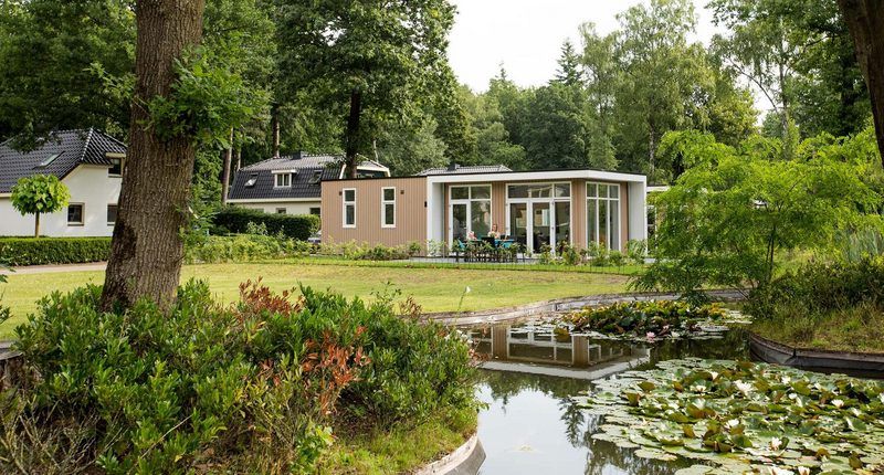 Modul 5 Personen Ferienhaus mit Teich in Ede, Veluwe, Gelderland, umgeben von Natur.
