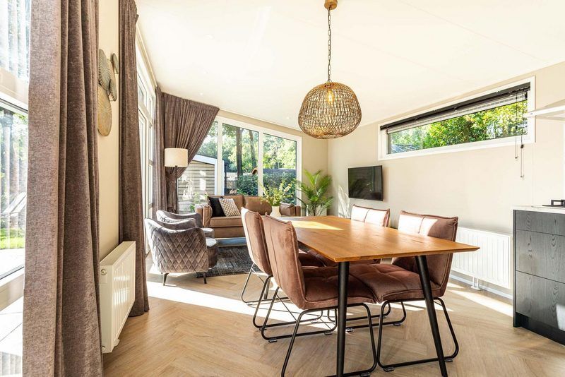 Dining room and sitting area of Silva 4 persons Wellness vacation home in Ede, Veluwe.
