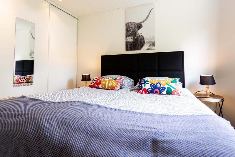 Gemuetliches Schlafzimmer im Ferienhaus fuer 3 Personen, Ede, Veluwe, Gelderland, mit gemuetlicher Einrichtung.