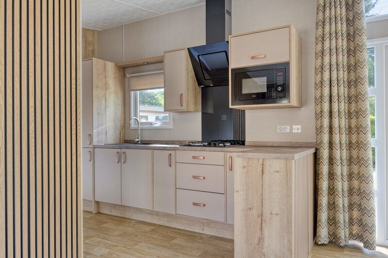 Fully equipped kitchen in Nova 4 persons Wellness vacation home in Ede, Veluwe, Gelderland with modern appliances.