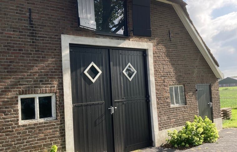 Schilderachtig uitzicht vanaf de veranda van Vakantiehuisje in Emst, Veluwe, Gelderland.