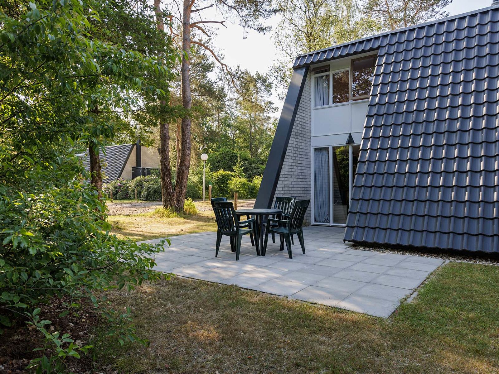 Terrace with seating at detached house in Hoenderloo, Veluwe, Gelderland.