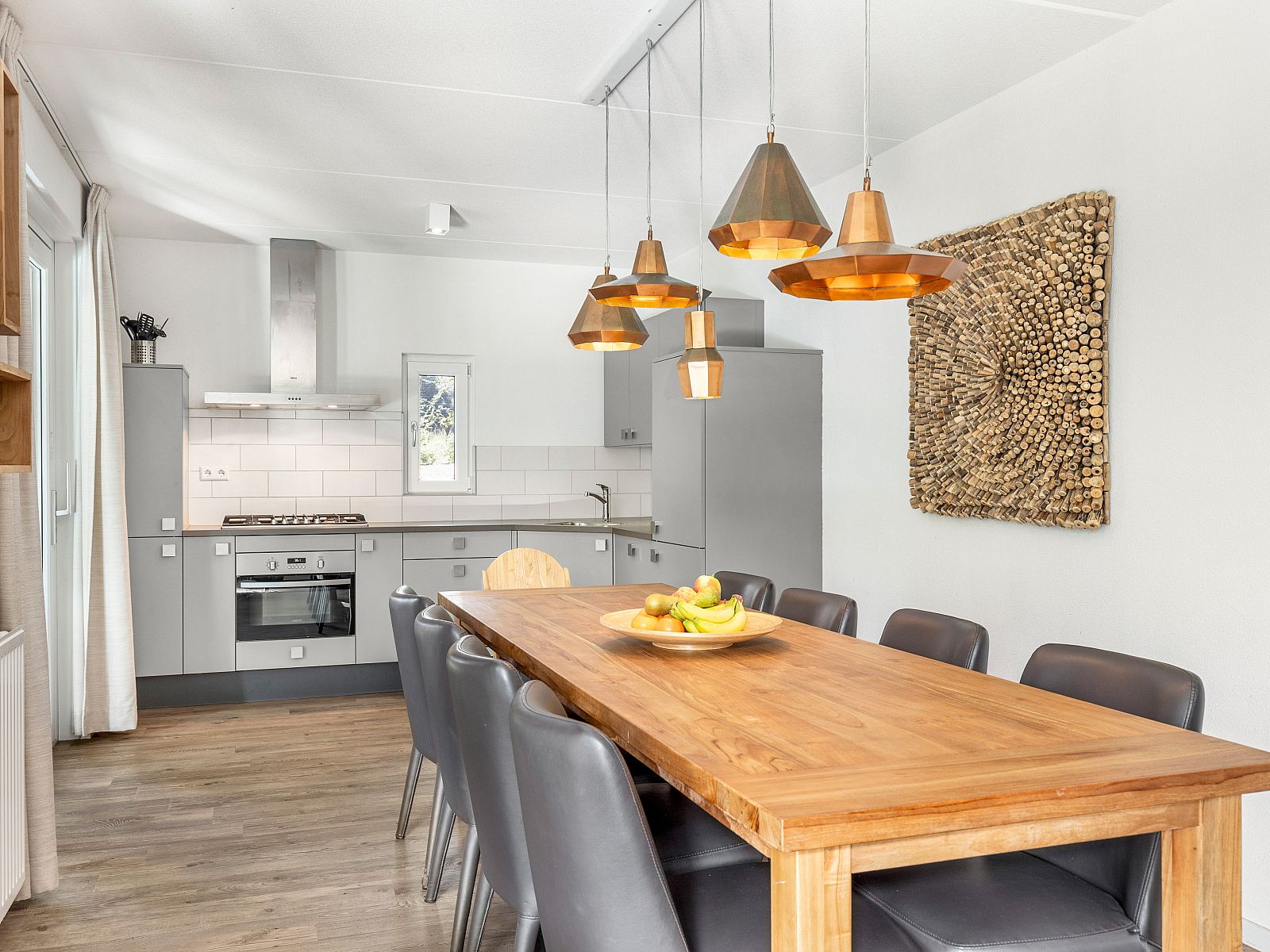 Detail of kitchen in Miggelenberg bungalow, Hoenderloo, Veluwe, Gelderland with gas hob.