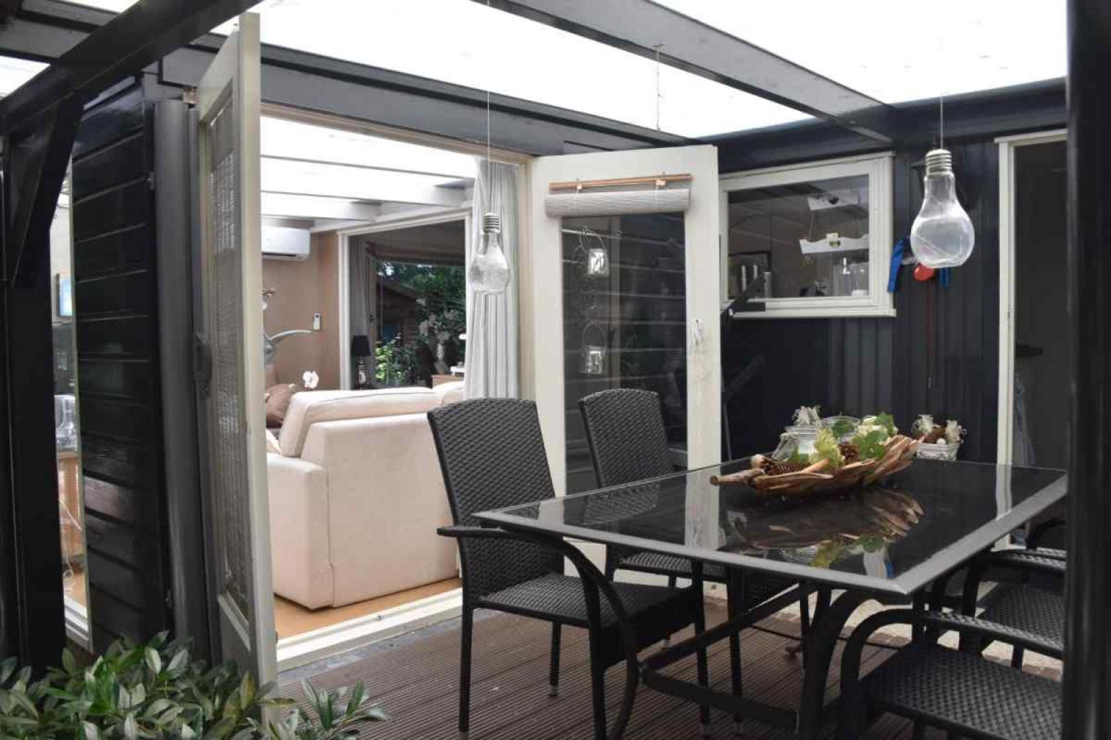 Rustic garden set at DG256 vacation home in Putten, Veluwe, Gelderland.