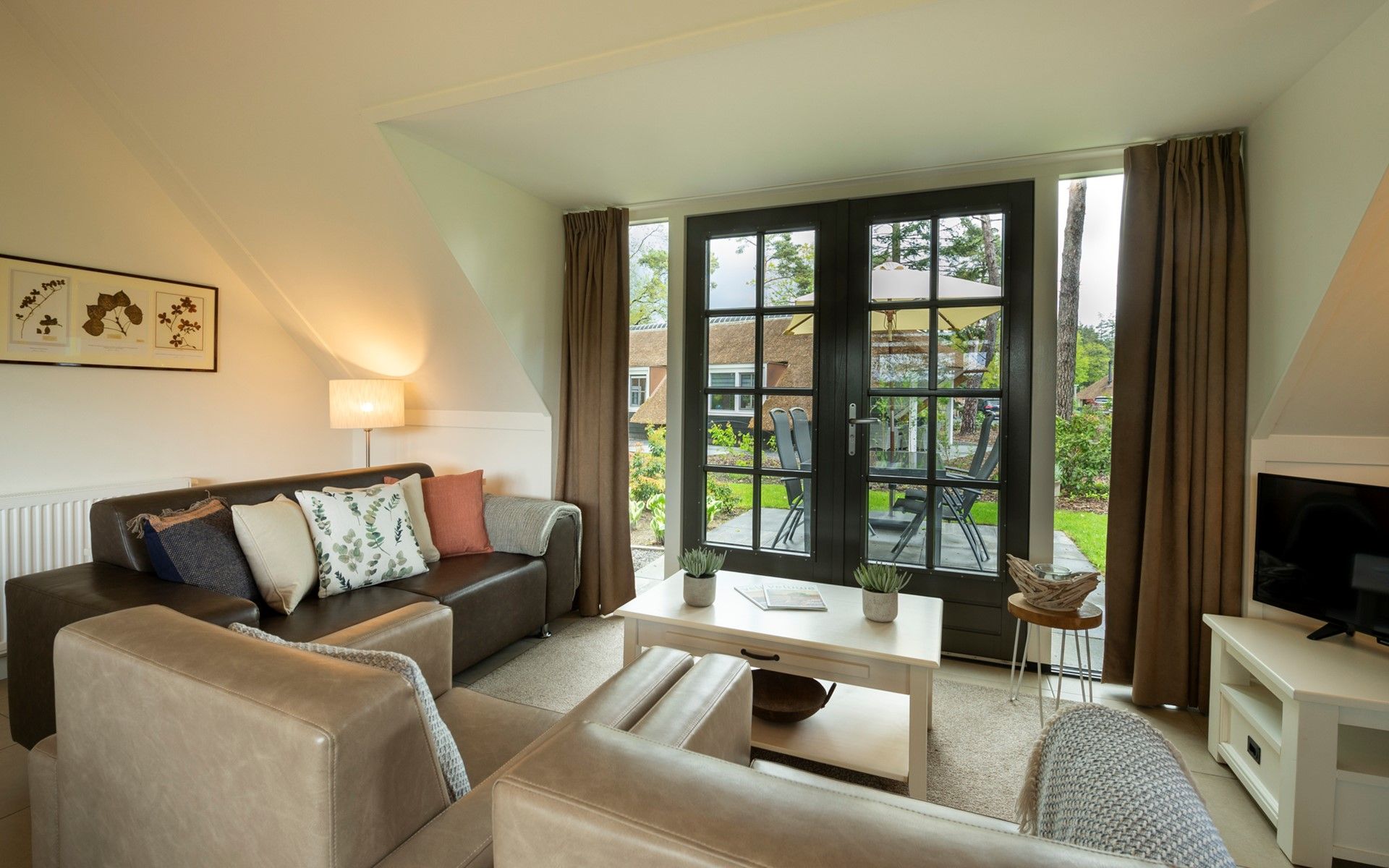 Comfortable sitting area in Holiday home Sprielderbosch 12 'De Kuifmees', ideal vacation home in the Veluwe, Putten.