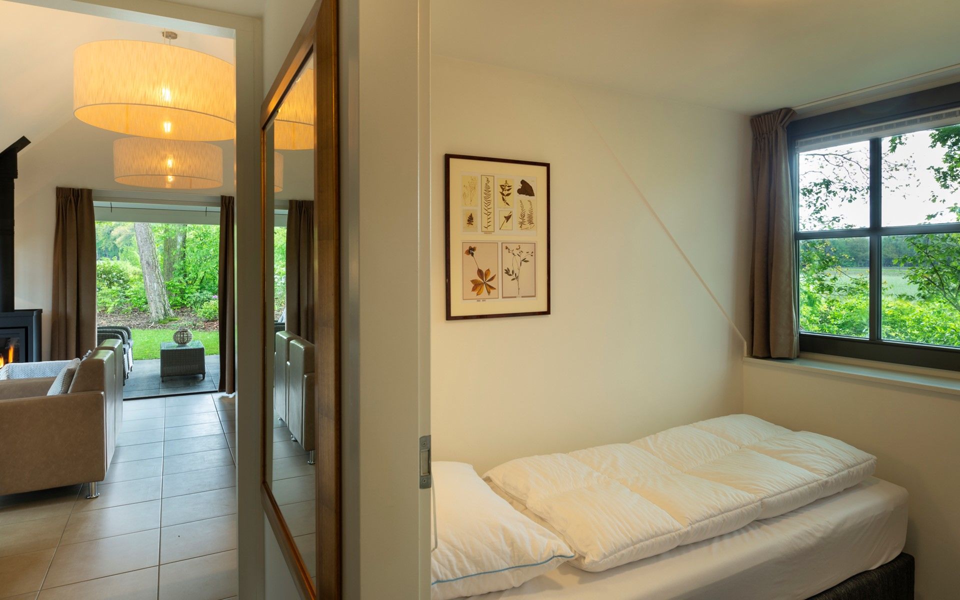 Cozy bedroom in Holiday home Sprielderbosch 12 'De Kuifmees', vacation home on the Veluwe, Putten.