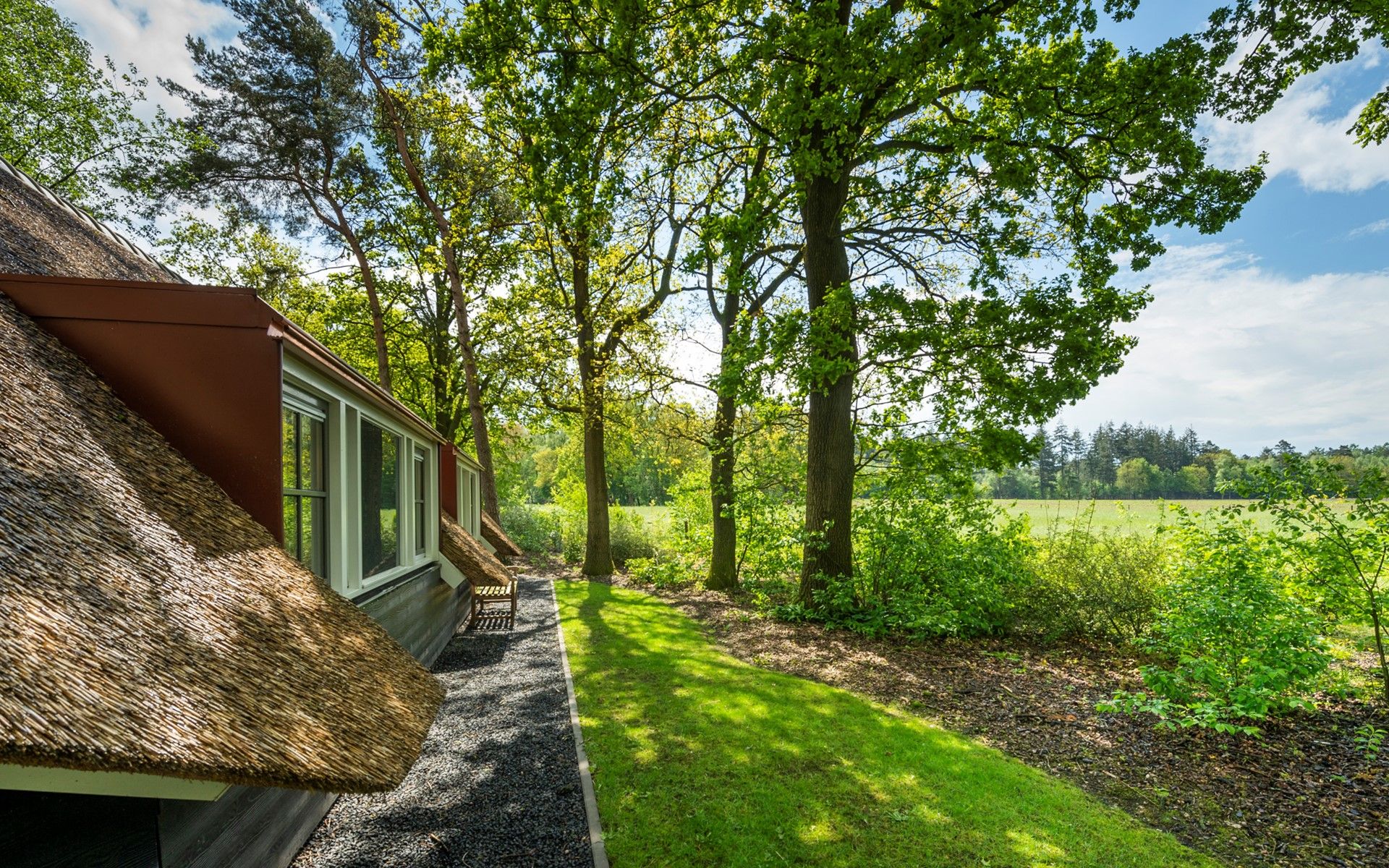 Beautiful garden surrounding Vakantiewoning Sprielderbosch 12 'De Kuifmees', vacation home in Putten, Veluwe.