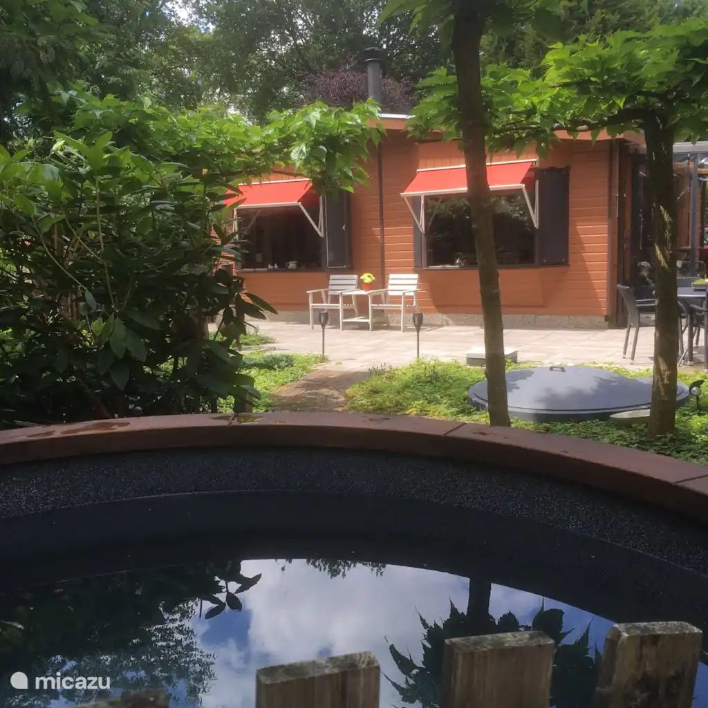 Unterkunft 3220244 - Chalet Veluwe - Veluweboshuisje met airco en hottub.