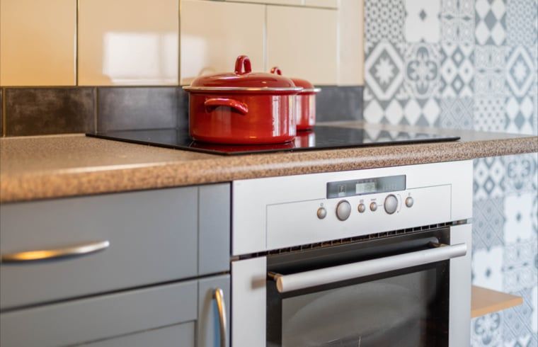 Detail of kitchen in Cottage in Wezep Oldebroek, Veluwe, Gelderland with stove and oven.