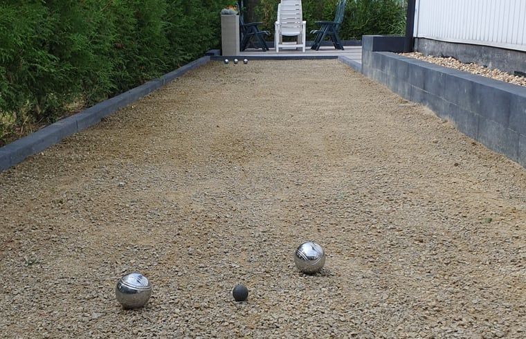 Petanquebaan bij Vakantiehuis in Voorthuizen Veluwe voor recreatieve activiteiten.