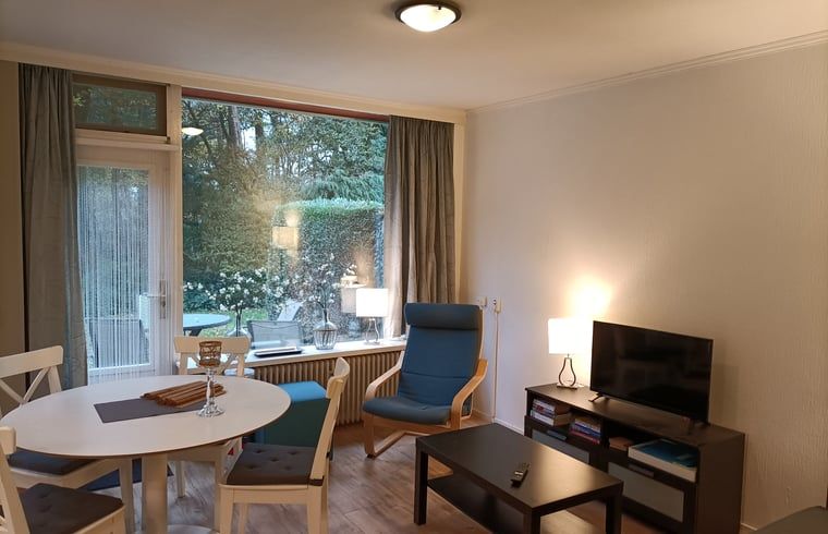 Knusse woonkamer van Vakantiehuisje in Otterlo, Veluwe, Gelderland.