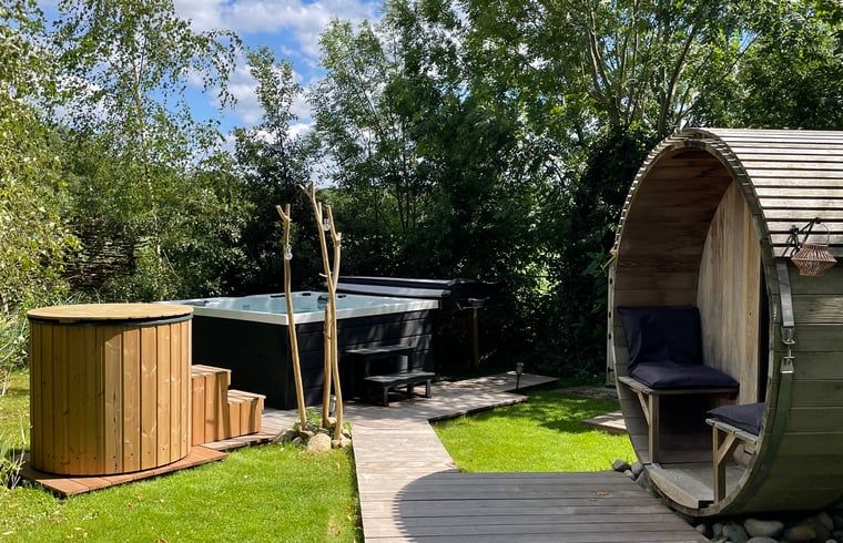 Geniessen Sie luxurioese Entspannung im Ferienhaus in Scherpenzeel, Gelderland, mit Sauna und Jacuzzi an der Veluwe.