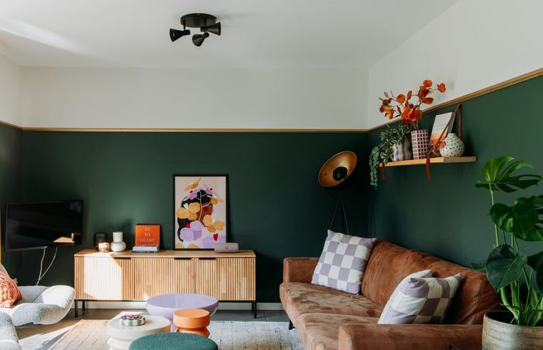 Cozy living room in Holiday home in Nunspeet, Veluwe, with comfortable seating area and stylish decoration.