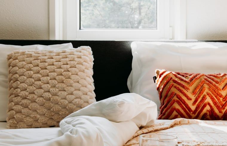 Comfortable beds in Cottage in Nunspeet, Veluwe, with soft pillows and a warm blanket.
