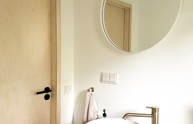 Cozy terrace with dining table at cottage in Nunspeet, Veluwe, Gelderland, perfect for outdoor dining.