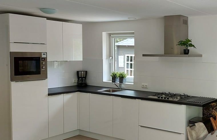 Fully equipped kitchen in Holiday cottage in Nunspeet, Veluwe, ideal for culinary adventures in Gelderland.