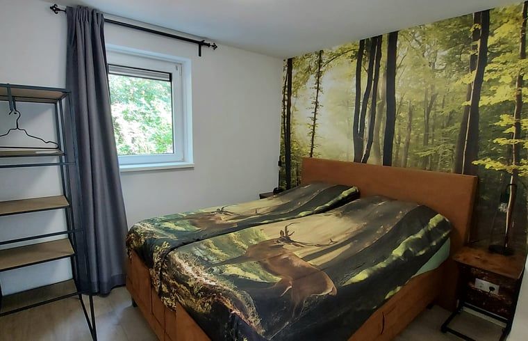 Comfortable bedroom in Holiday home in Nunspeet, Veluwe, with beautiful nature theme in Gelderland.