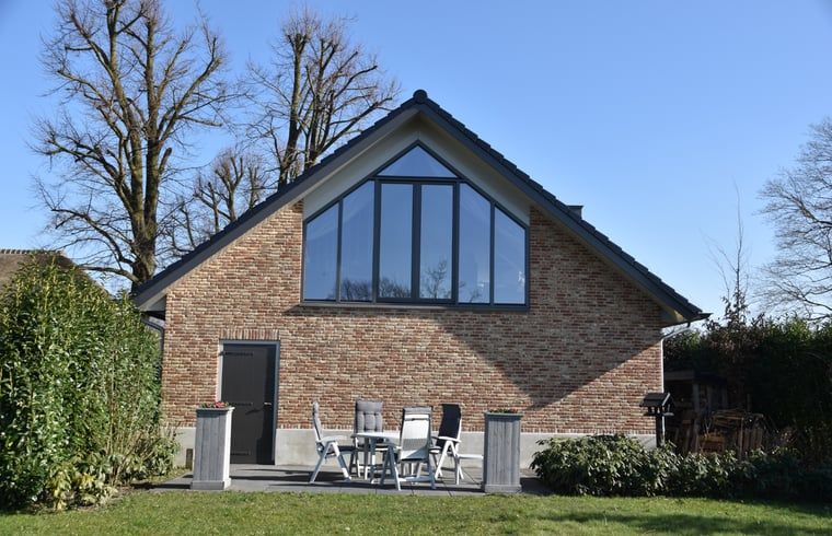 Aussenbereich des Ferienhauses in Lunteren mit Terrasse in Veluwe, Gelderland.