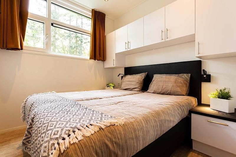 Zweites Schlafzimmer in einer speziellen 5 Personen Ferienwohnung, Lunteren, Veluwe, Gelderland, mit moderner Einrichtung.