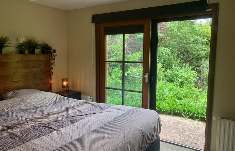 Bedroom in Cottage in Lunteren, Veluwe, with direct access to garden.