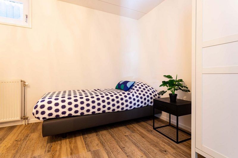 Einzelzimmer in Boshoeve 10 Personen Wellness Spa Ferienhaus Lunteren, Veluwe mit stilvoller Einrichtung.