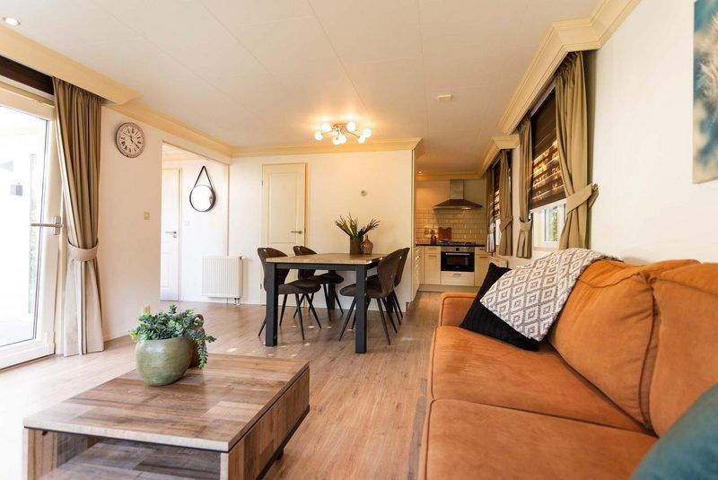 Ruime woonkamer in Holiday home 5 personen Wellness, Lunteren, met keuken, Veluwe.