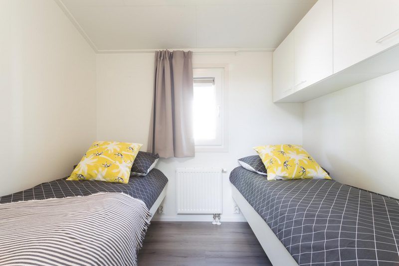 Gemuetliches Schlafzimmer mit zwei Betten in Rialto 6 Personen Ferienhaus, Lunteren, Veluwe.