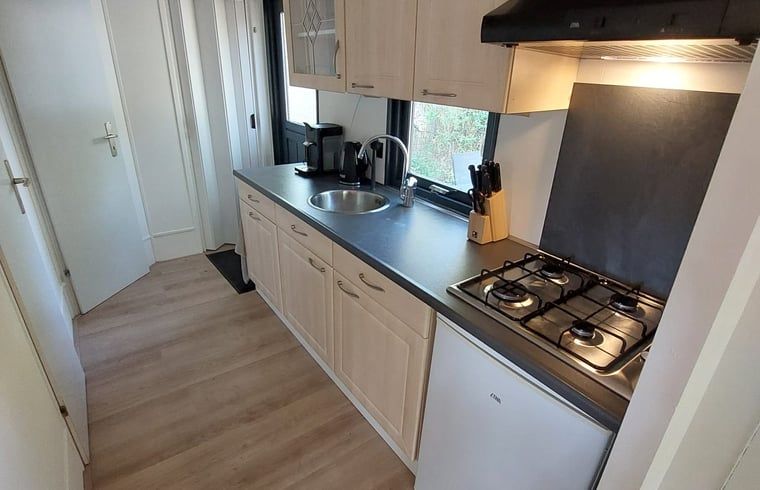 Gas stove in kitchen of Cottage in Hattemerbroek, Veluwe vacation rental for culinary adventures.