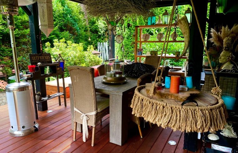 Gemuetliche ueberdachte Terrasse in Haus in Doornspijk, Ferienunterkunft in Doornspijk.