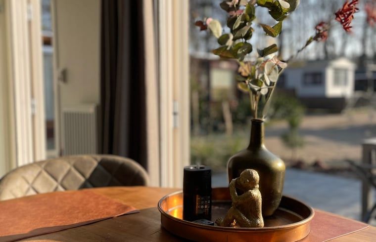 Cozy dining area in Cottage in Lieren overlooking nature, Veluwe, Gelderland.
